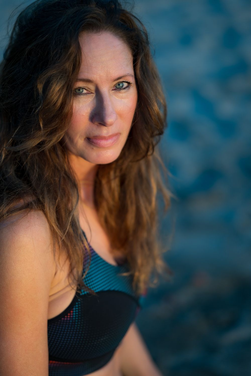Female yoga student sitting at the beach in Playa Negra Costa Rica
