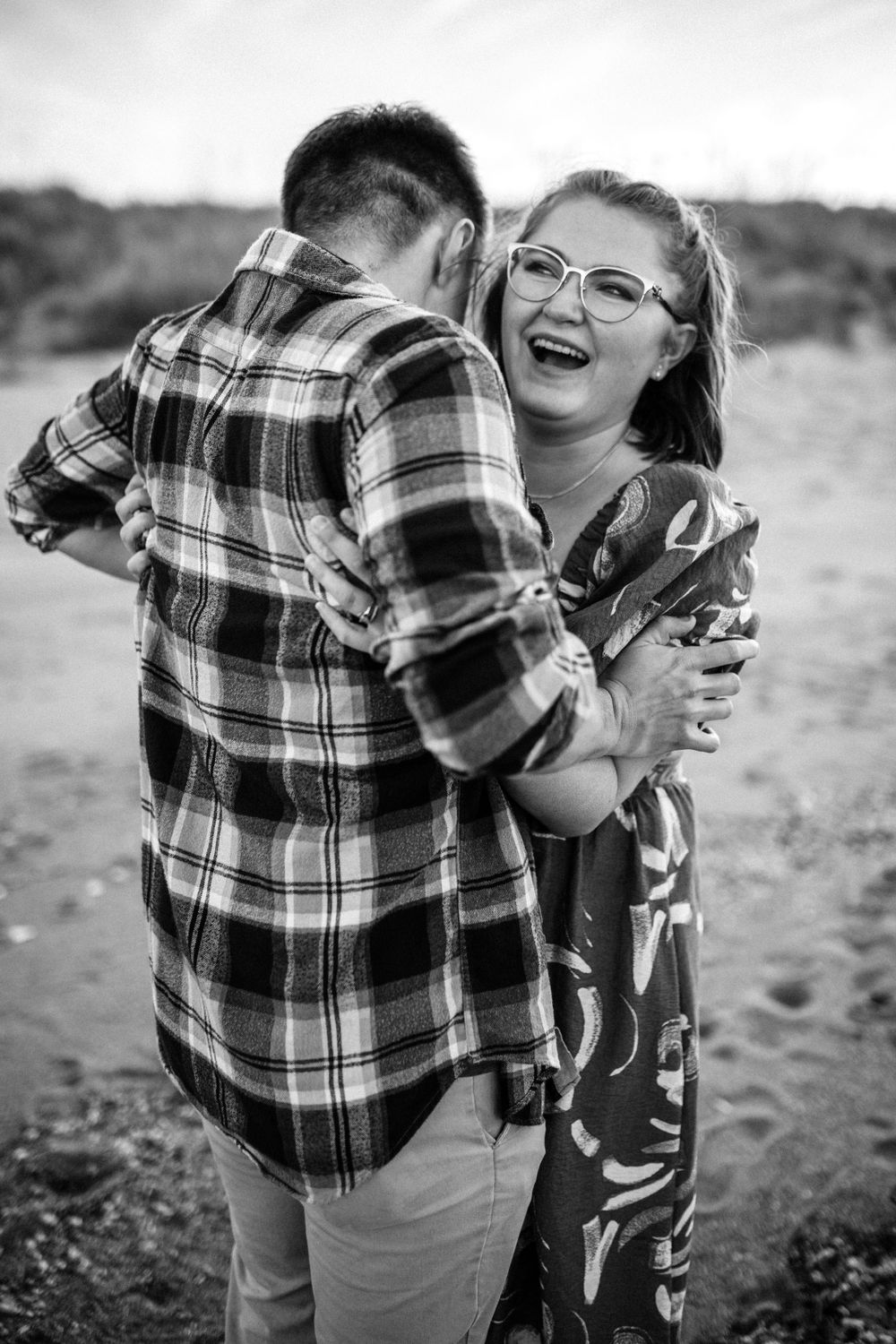 couple laughing on the beach in virginia beach, virginia beach elopement photography