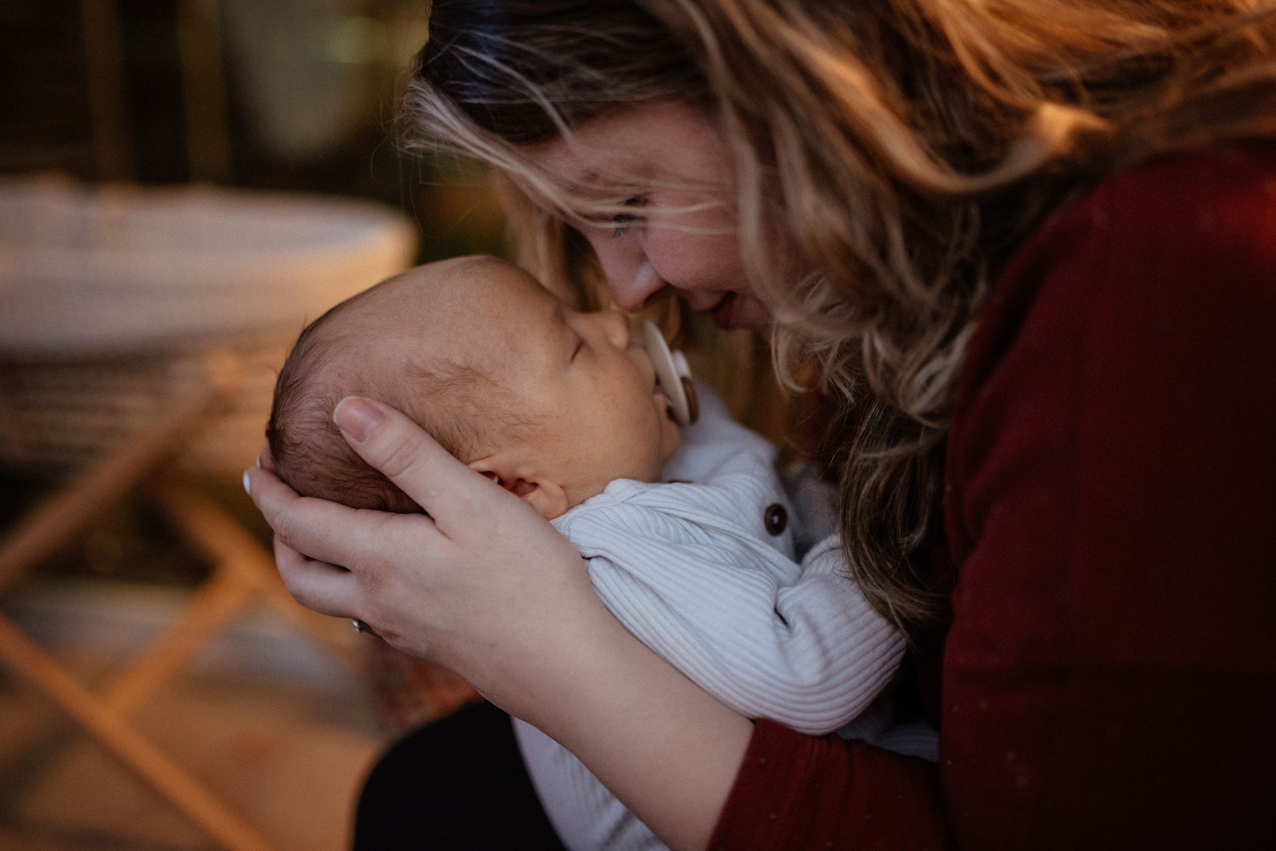 Warm-toned intimate photograph with soft focus and natural lighting.