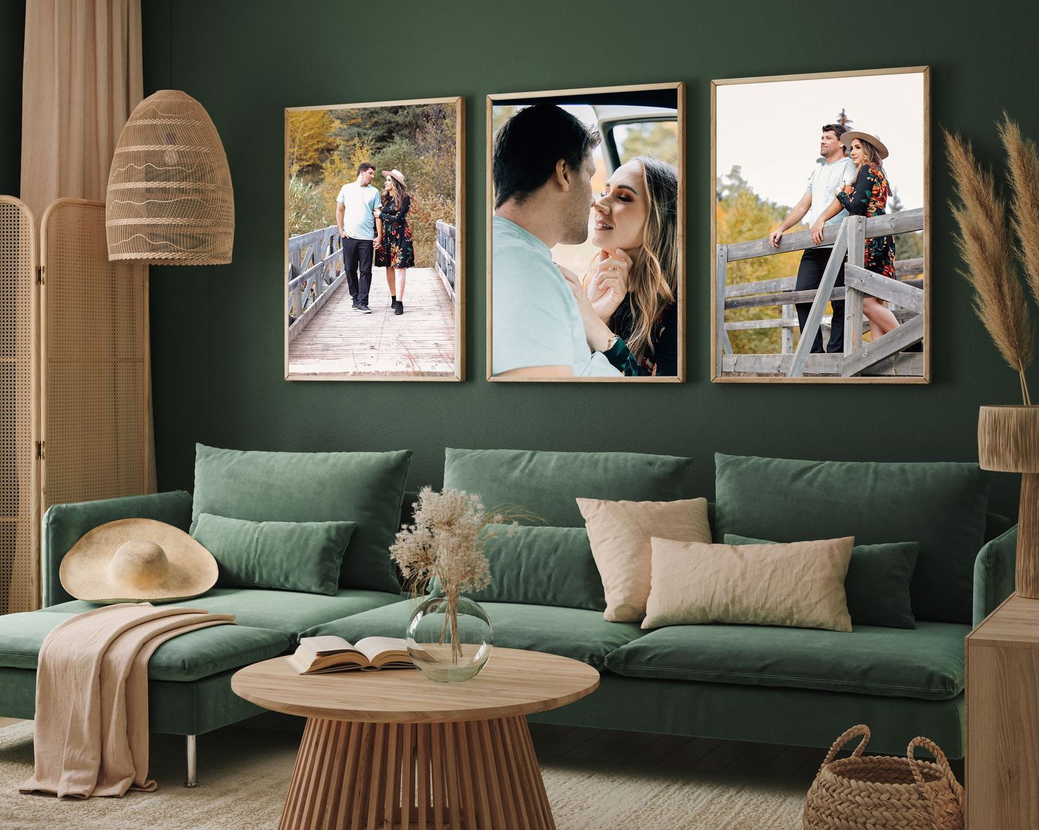 A cozy living room interior with dark green walls showcases framed photos and a comfortable sectional sofa.