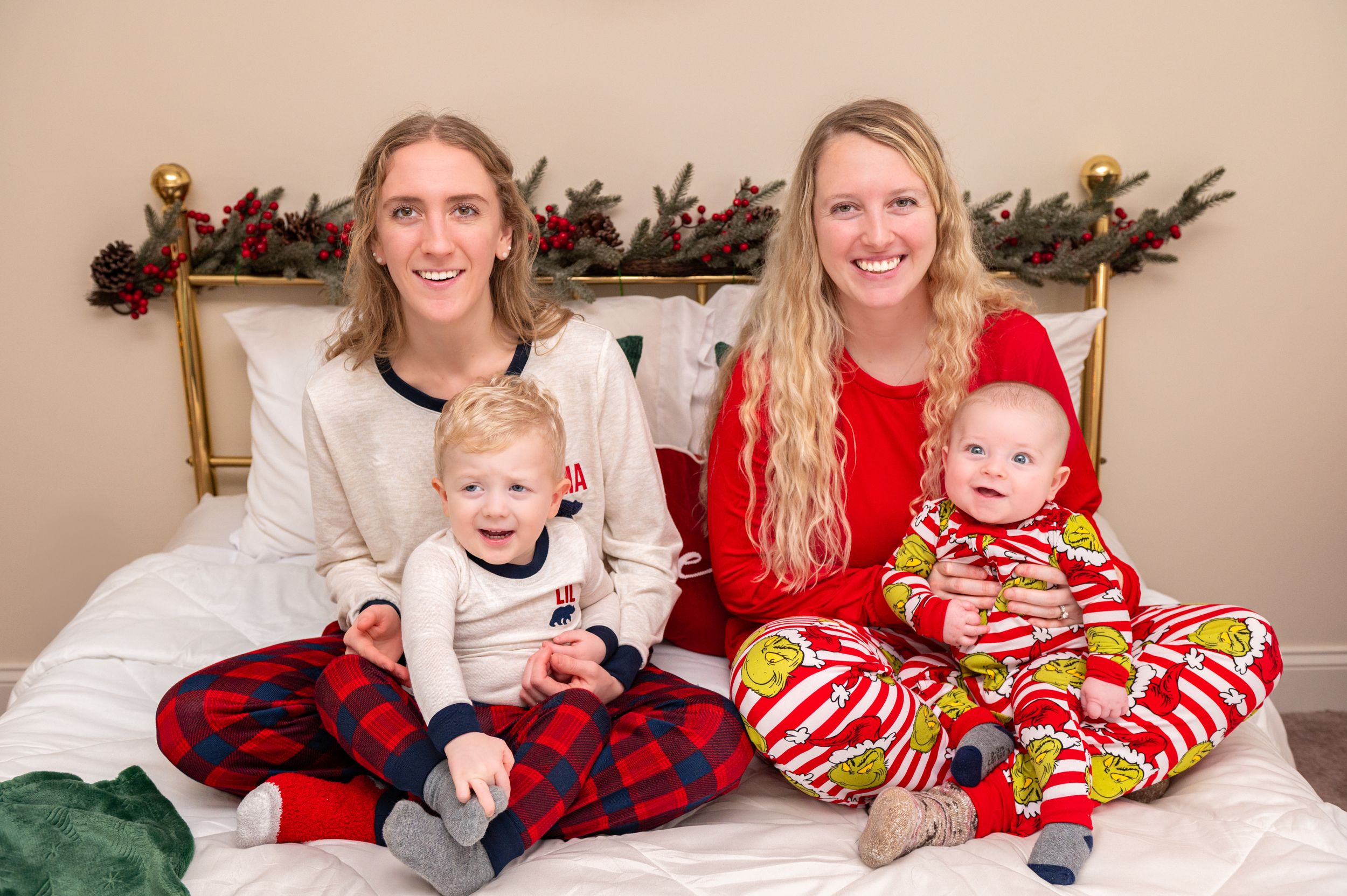 A cheerful holiday family photo session with matching pajamas and festive decorations.
