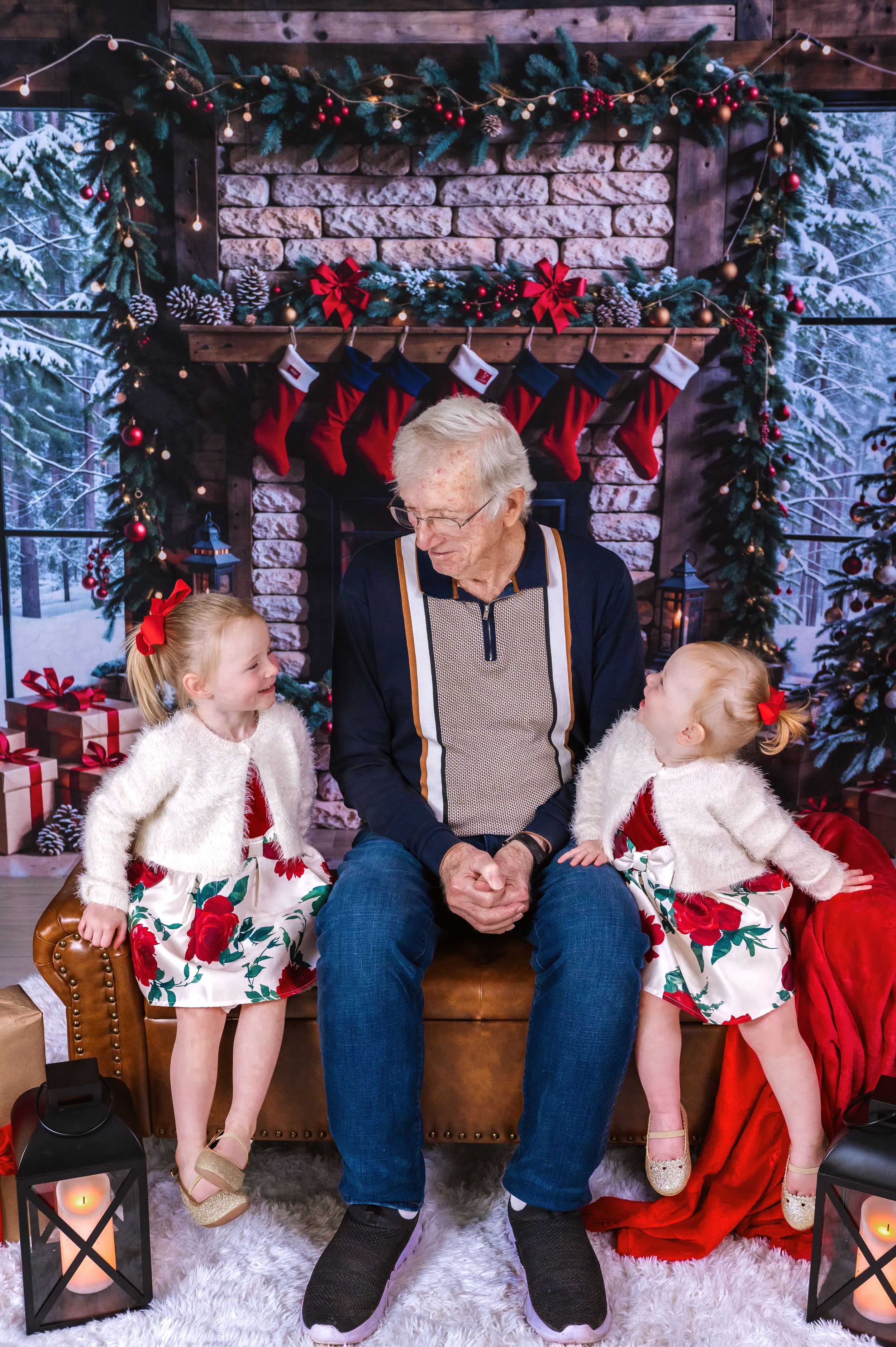 Studio Christmas photos with lanterns, stockings and holiday decorations.