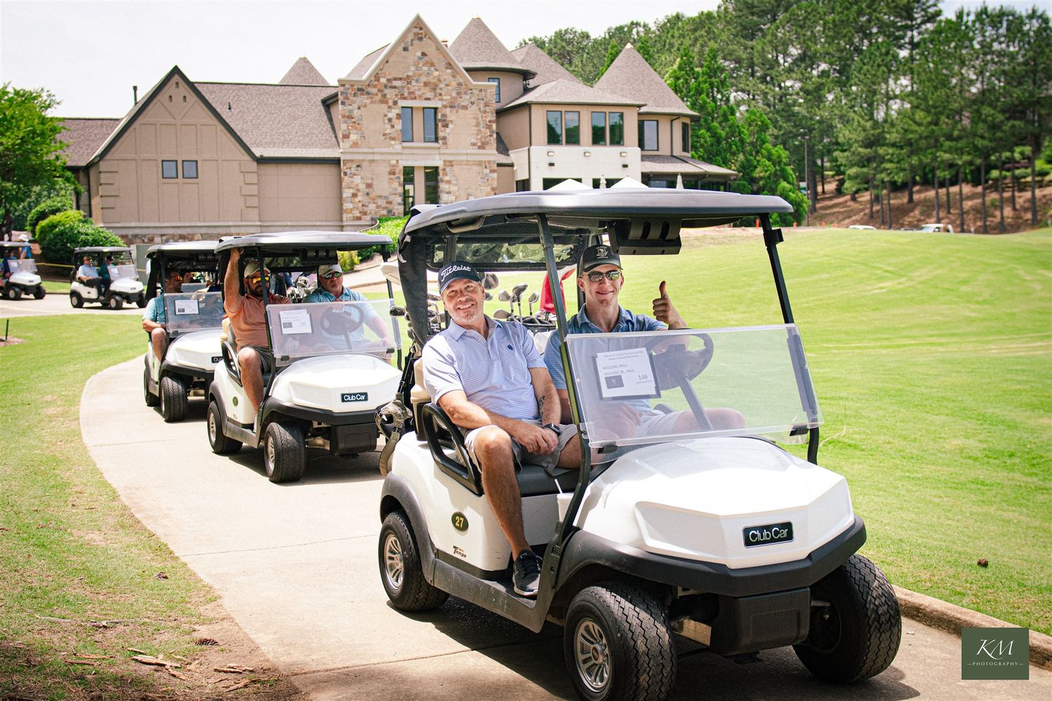 Smiling golfers in golf cart, golf tournament photography, Birmingham Alabama event photography.