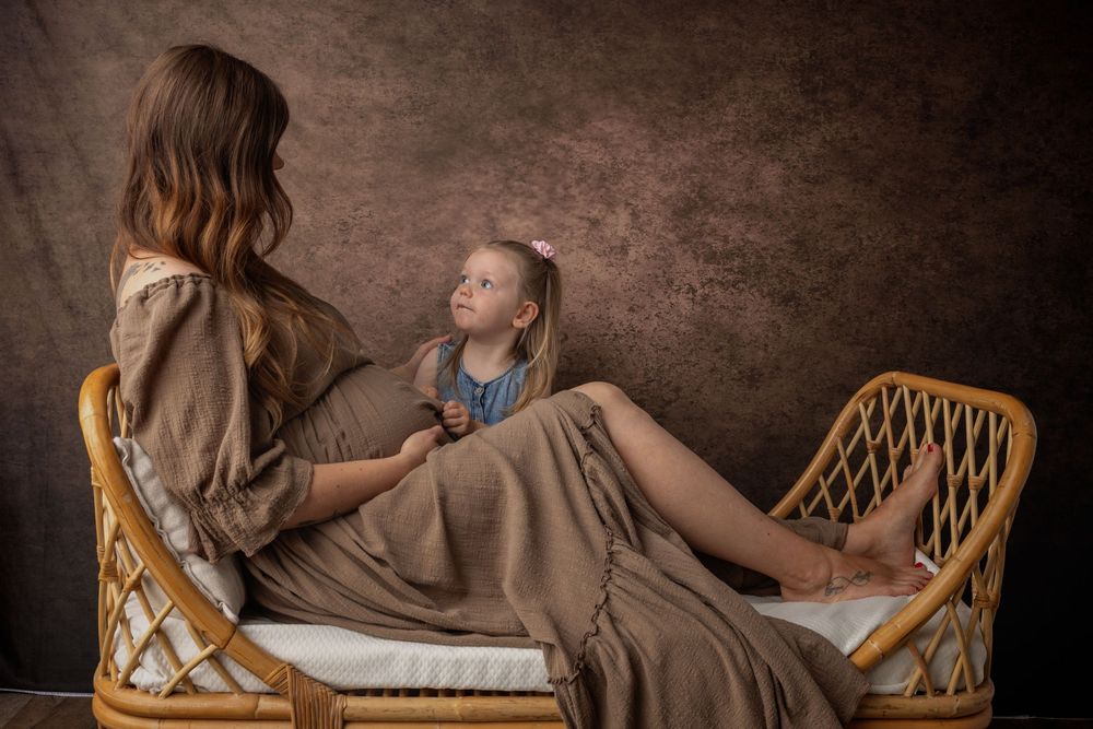 A collection of lifestyle portraits featuring someone posing on a rattan chair in earth-toned clothing.