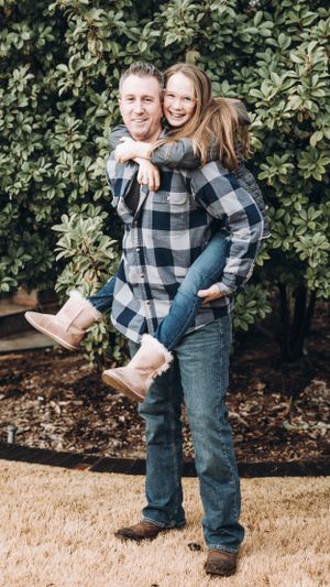 Playful family portraits with matching plaid shirts against green foliage backdrop.