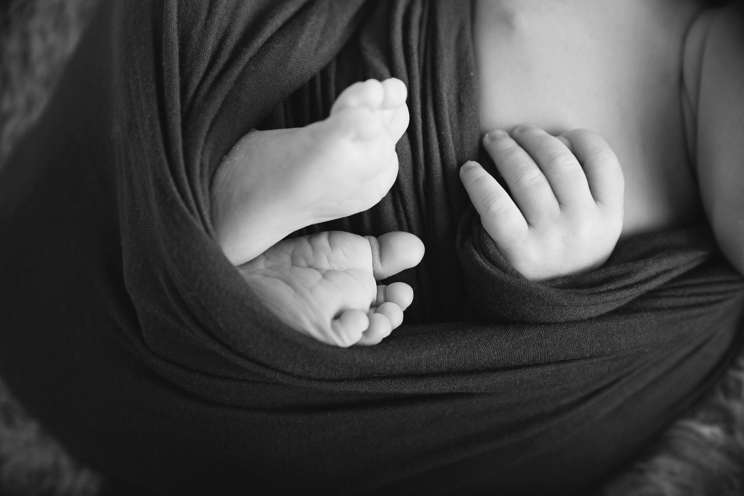 tiny features are always captured in your newborn session at Genesis Imagery