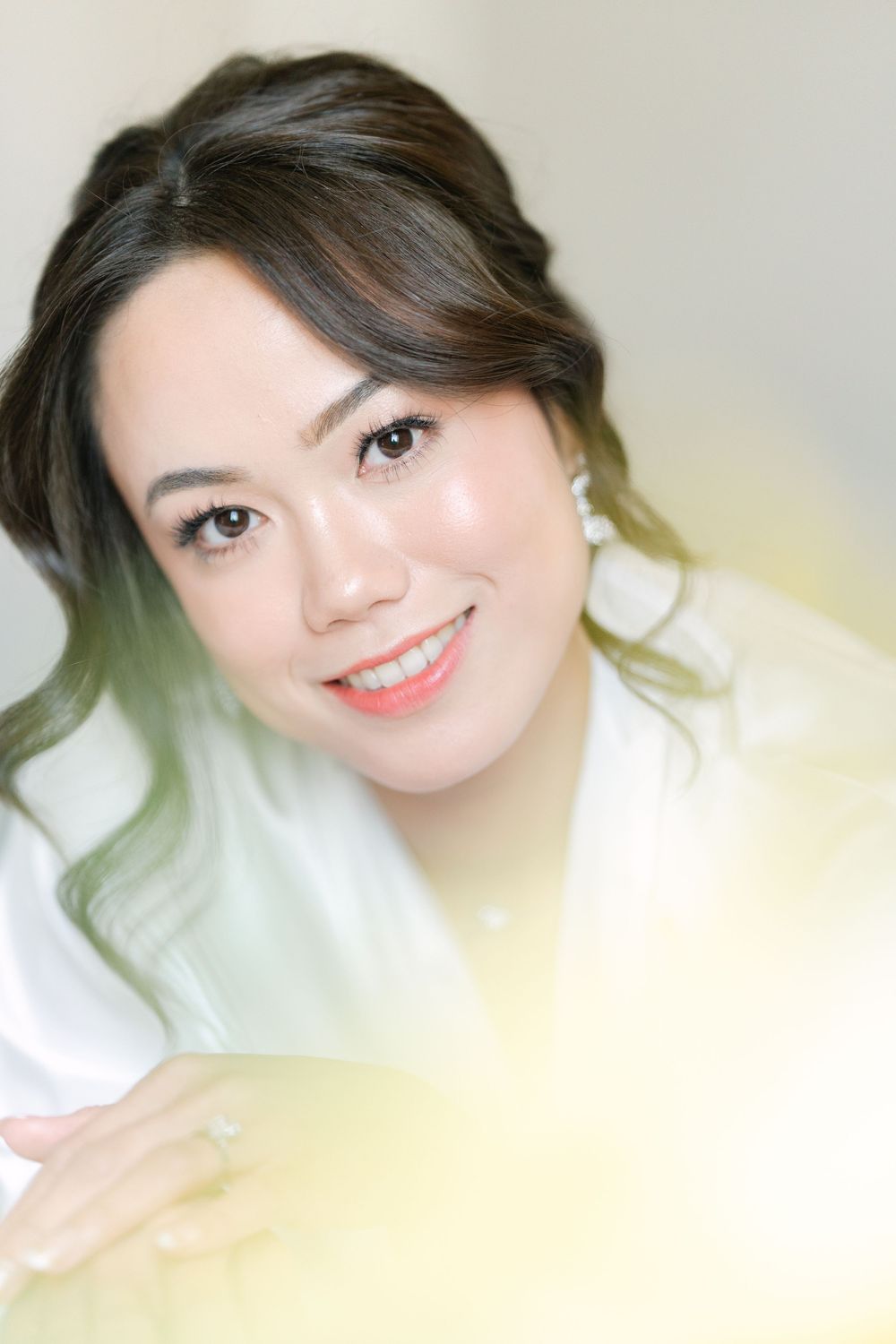 natural bridal portrait with soft makeup during wedding preparations