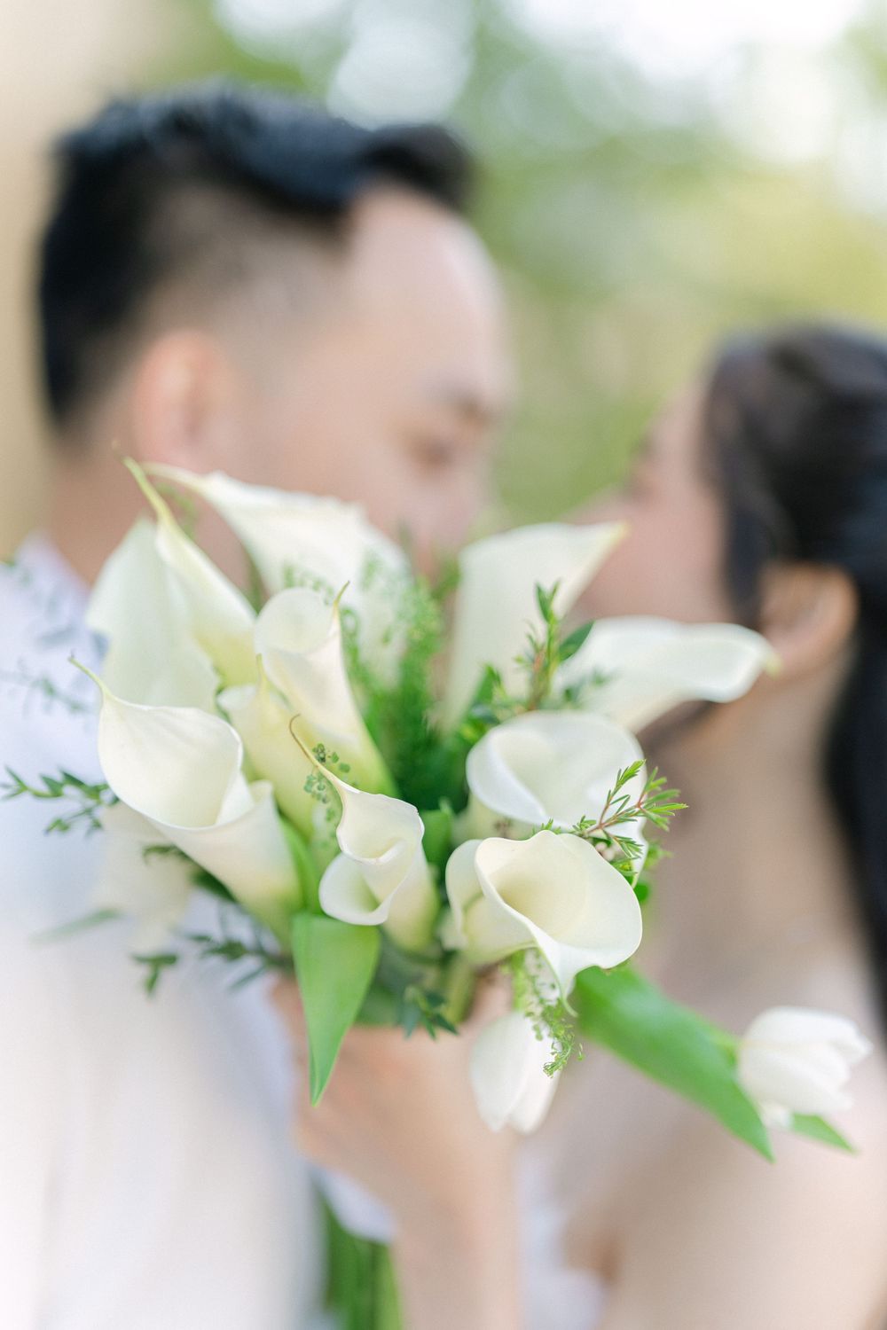 romantic close-up wedding portrait of the bride and groom