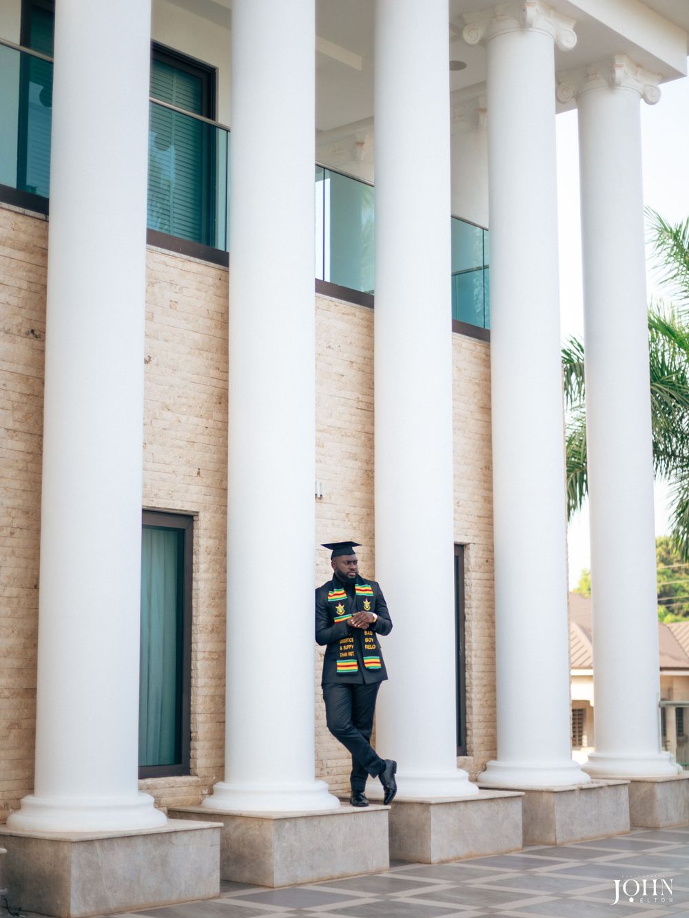 Artistic graduation photo sequence with white columns creating elegant architectural framing.