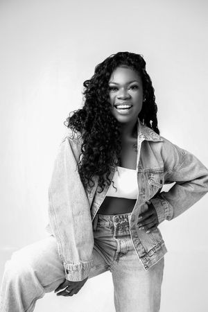 A black and white fashion portrait series showing a model in a light denim jacket against a white background.