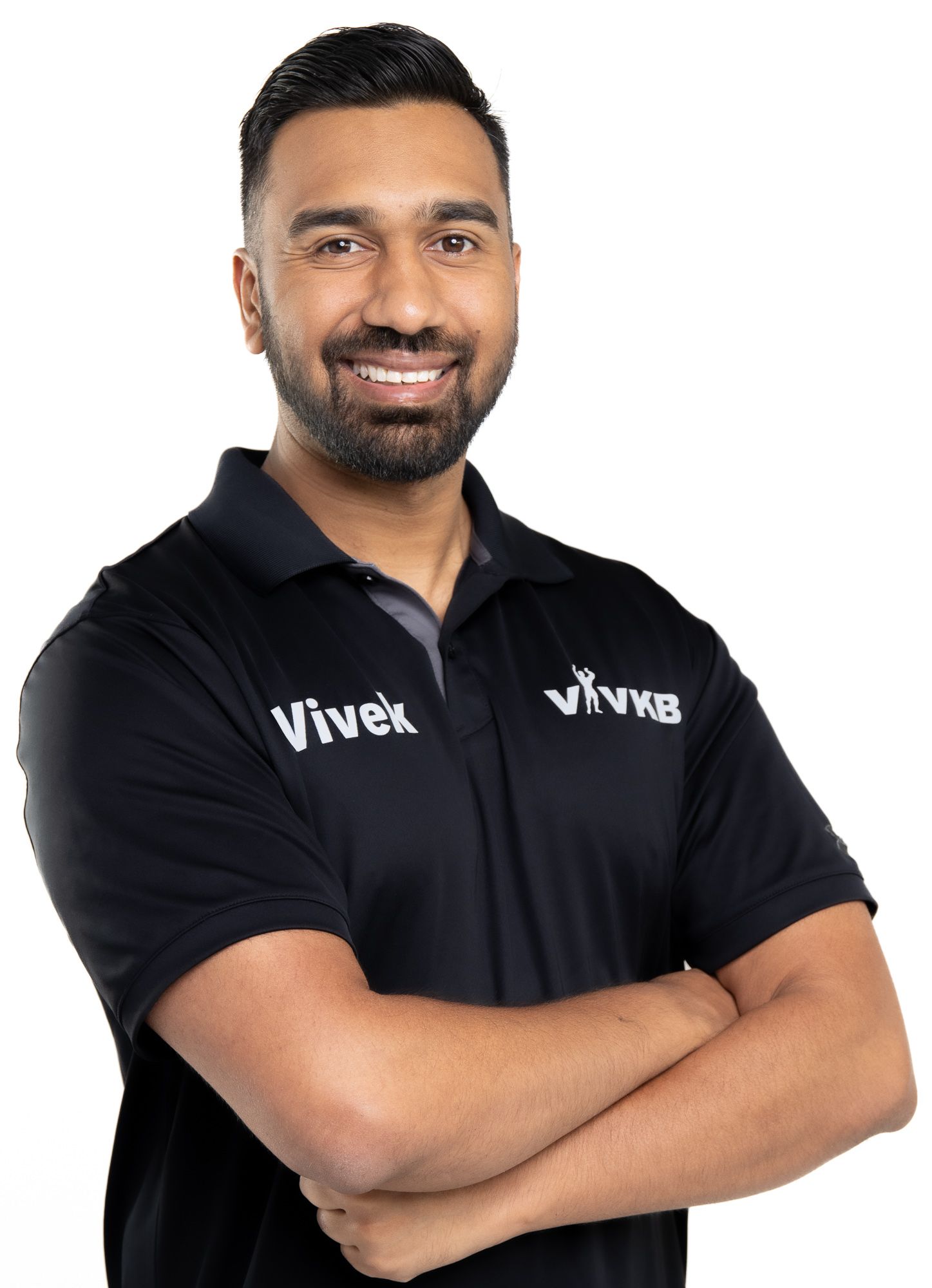 Business professional headshot with confident expression and studio lighting