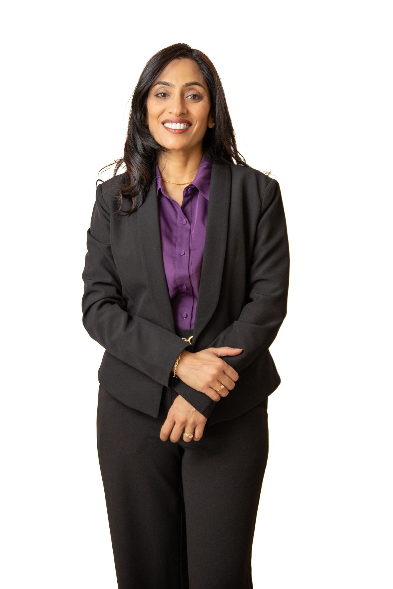Business professional headshot with confident expression and studio lighting