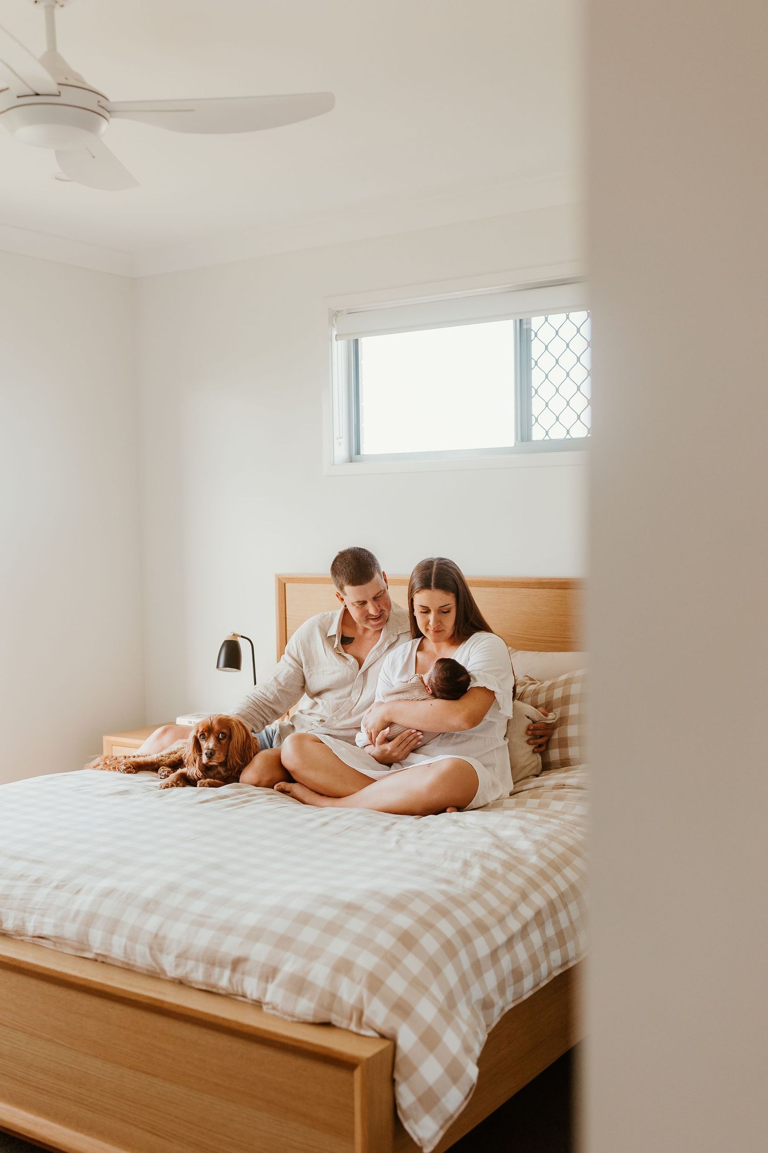 The Welcome Home session takes place in the comfort of your own space, capturing your family as you settle in together.