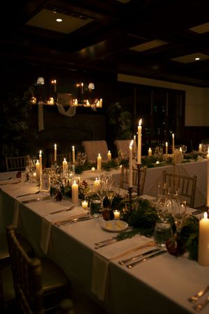 Candle lit reception, indoor, romantic golden light