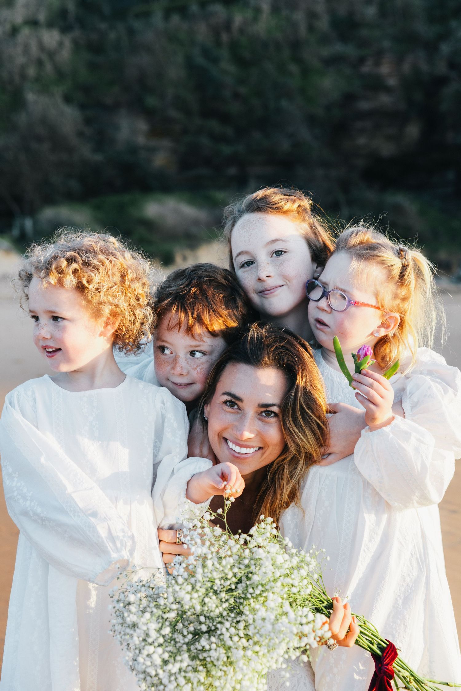 Family Photography - Mom with her four kids at Bilgola Beach, Northern Beaches, Sydney