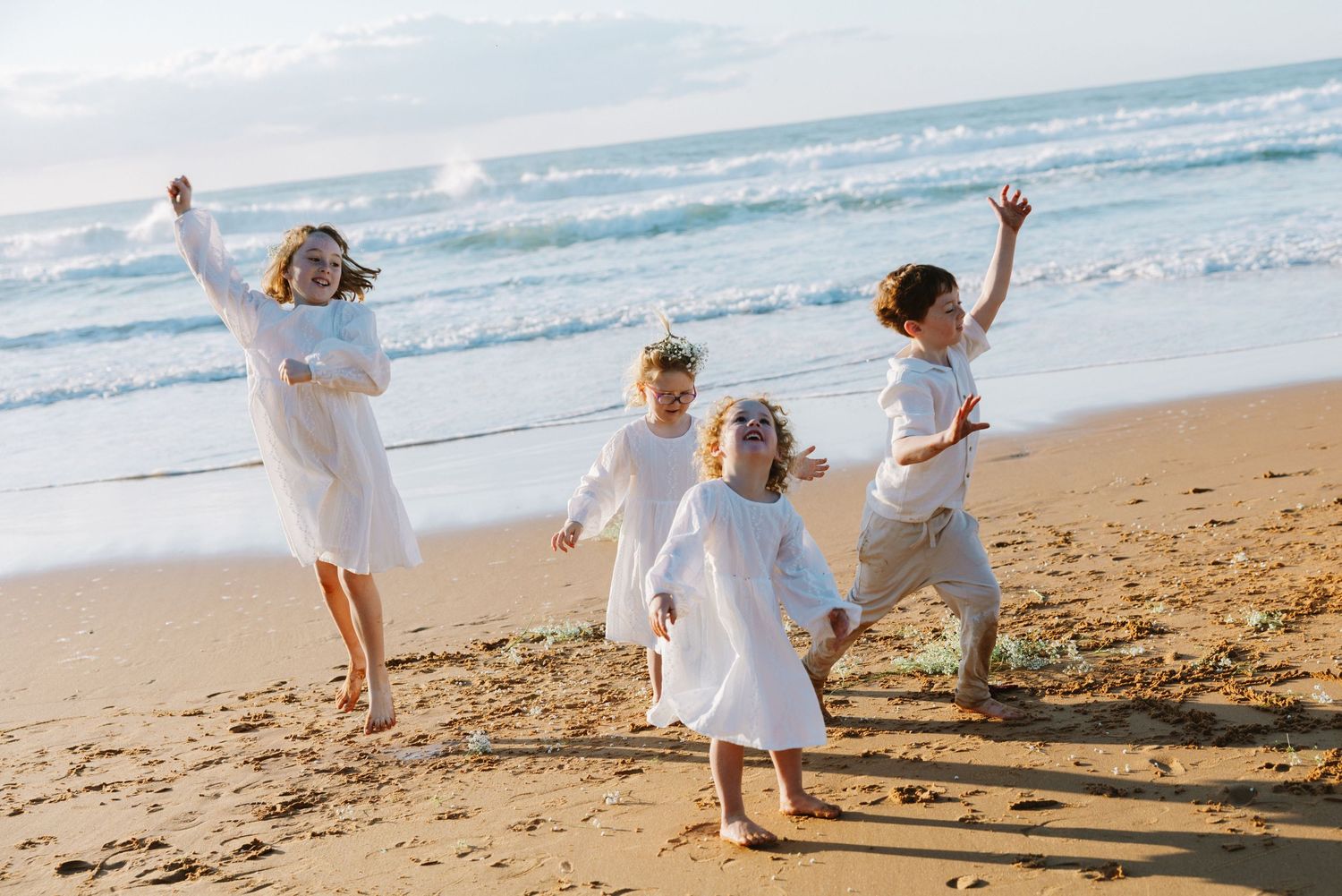 Family Photography - Playful siblings / kids at Bilgola Beach, Northern Beaches, Sydney