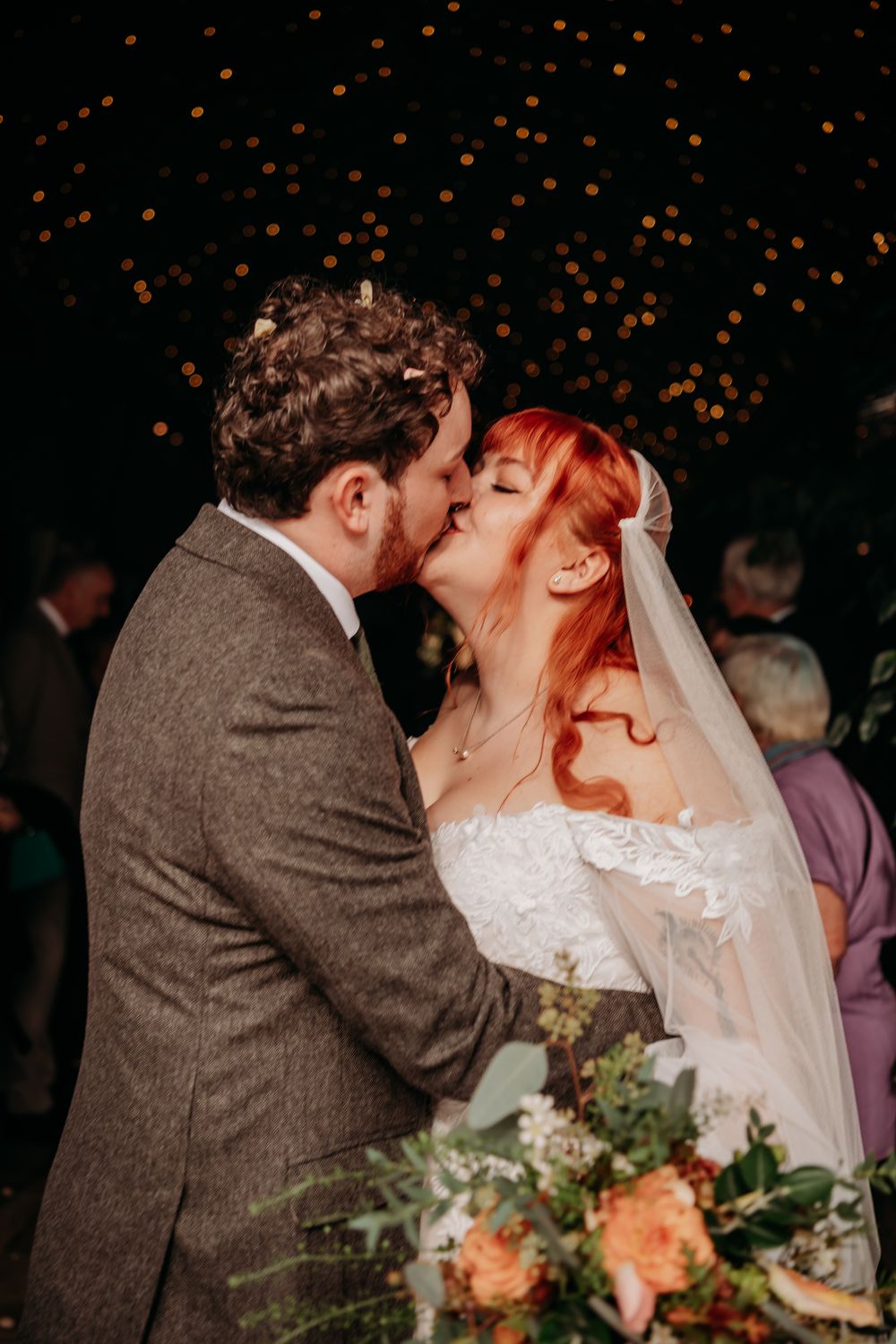 A romantic wedding moment captured in a sequence of photos with glowing bokeh lights in the background.