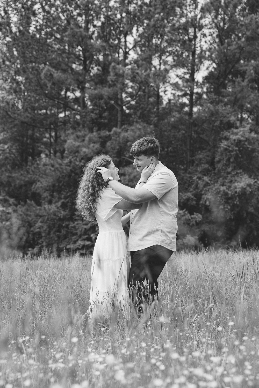 A black and white sequence shows a couple dancing in a wildflower meadow. Le Château du Cœur Wedding Photographer