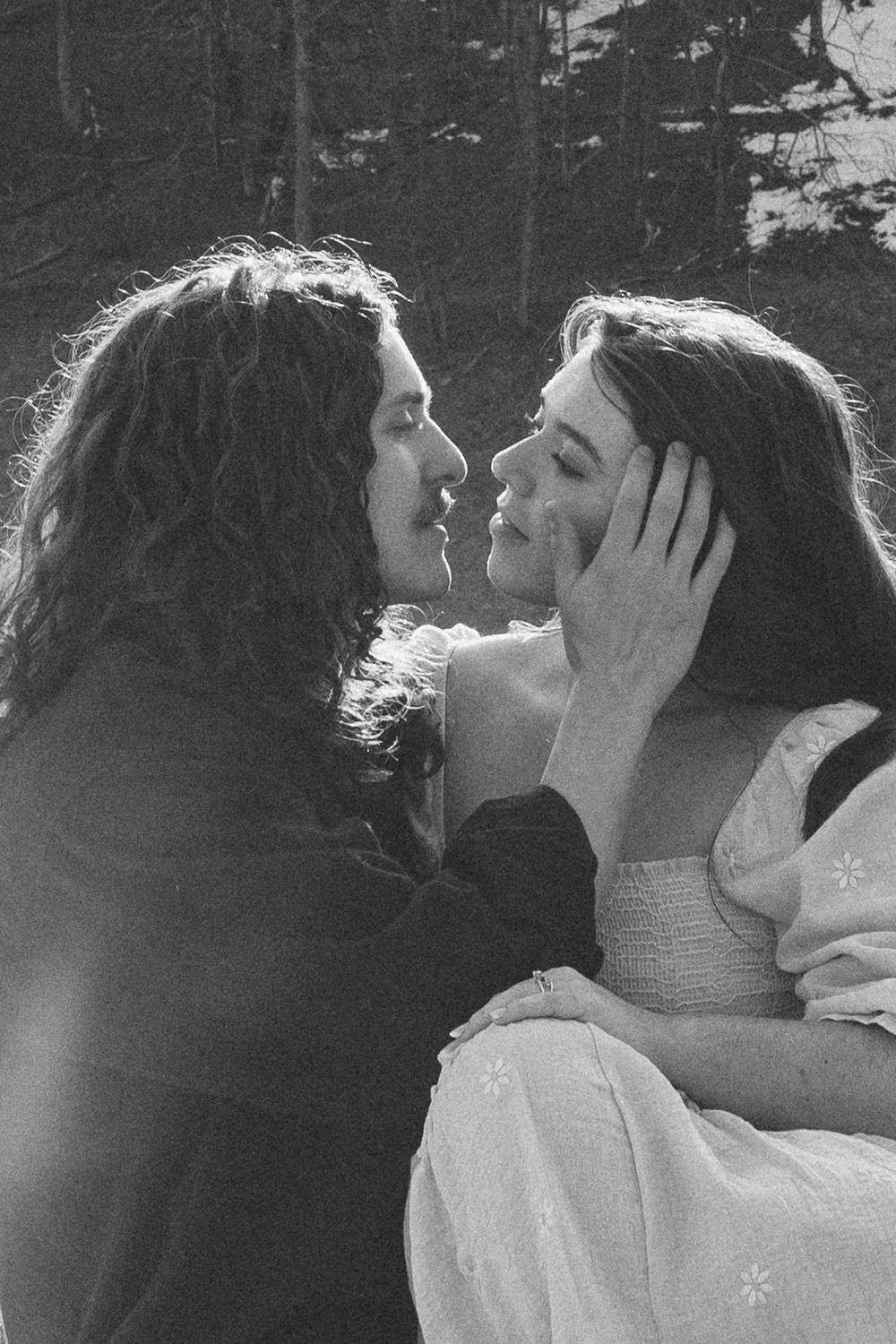 A black and white portrait capturing a tender moment between two people. Linbrook Heritage Estate Wedding Photographer