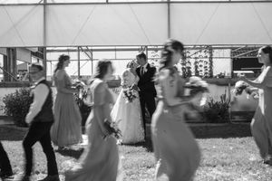 A motion blur movement photo of a bridal party.