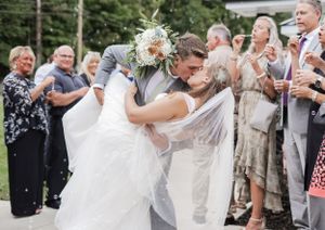 A dip kiss on a wedding day