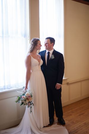 Bride & Groom gazing at each other.