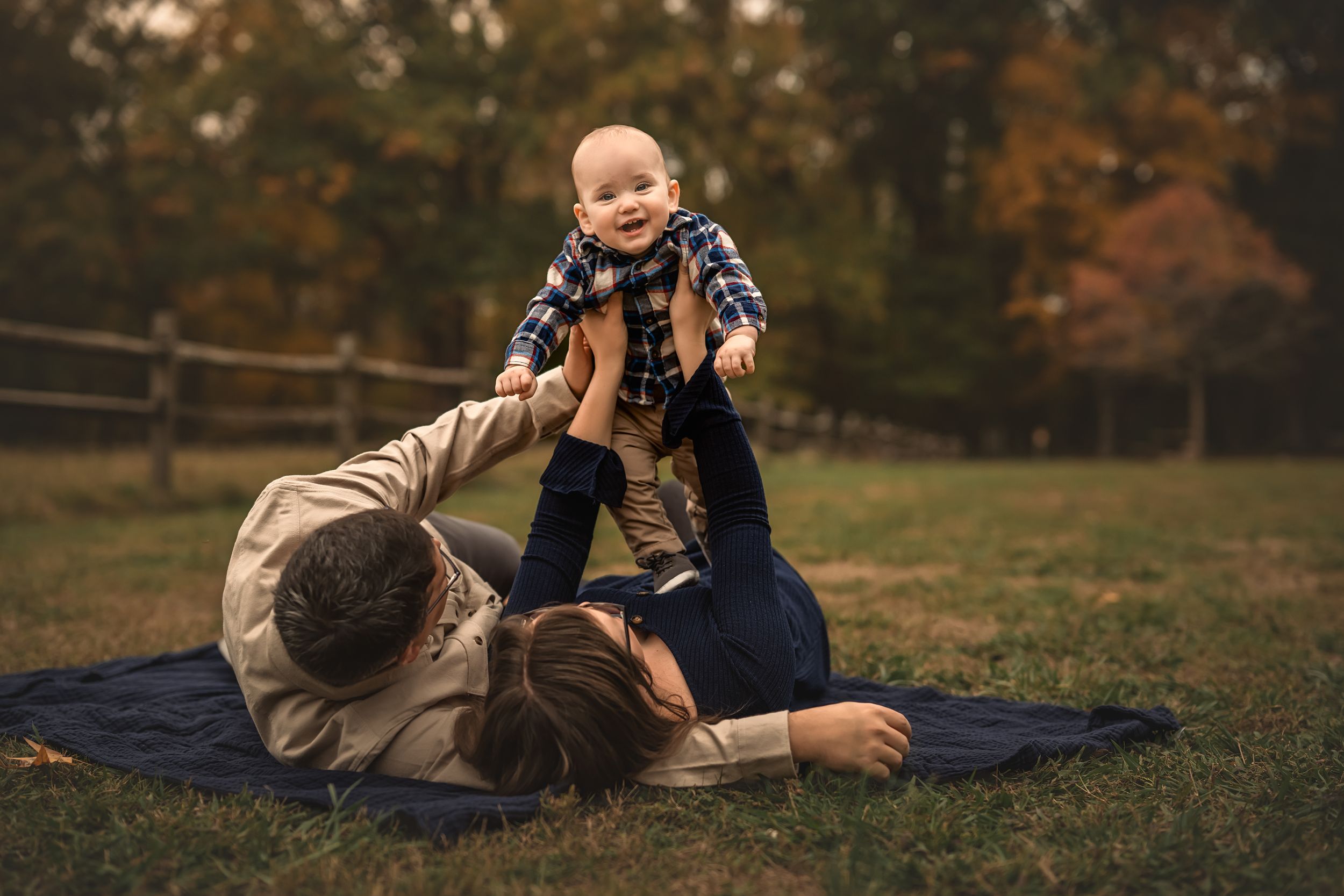 Candid moments captured of outdoor play in a rustic field during fall season.