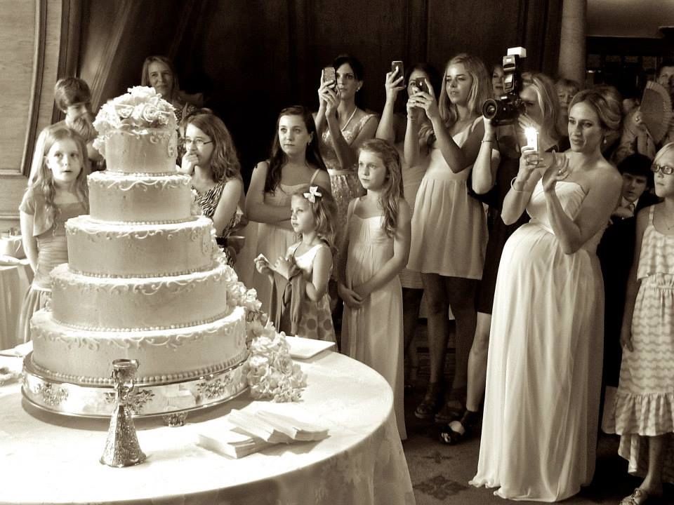 A sequence of wedding cake cutting photos shows the traditional first slice ritual and the dreams of many a woman.