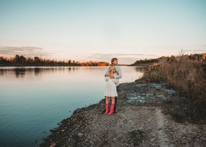 A scenic panoramic series of lake shoreline photos at sunset with rocky beaches and golden light on the water.