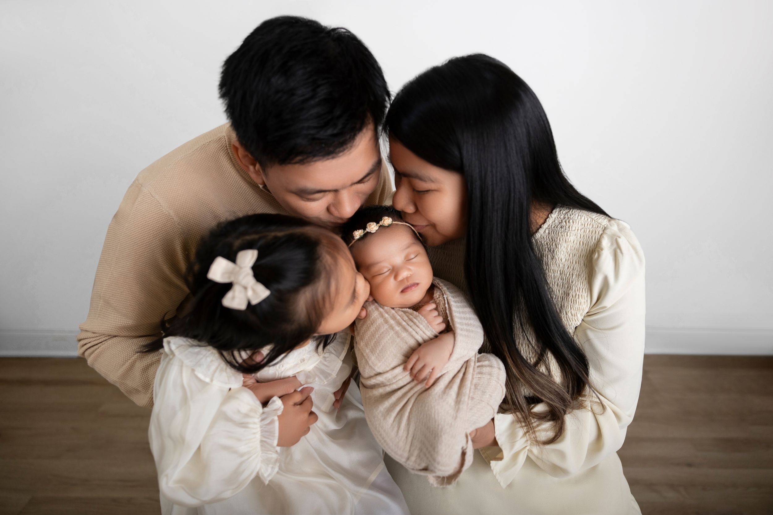 Newborn Photographer in NJ who has a photography studio in Sussex County. The best nj newborn photographer - family welcoming their new baby