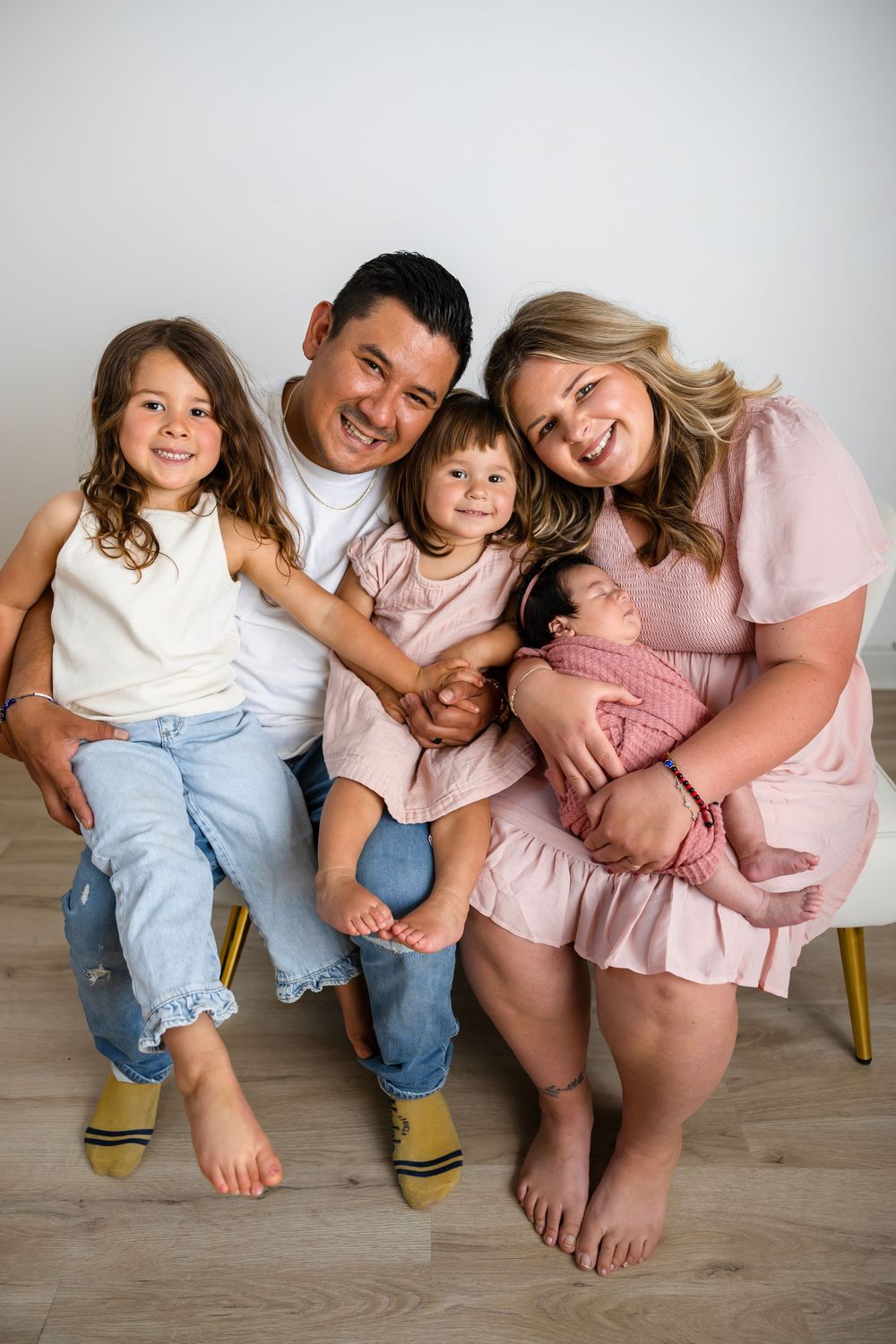 Happy family of five posing together.  NJ photography studio located in Sussex County NJ.