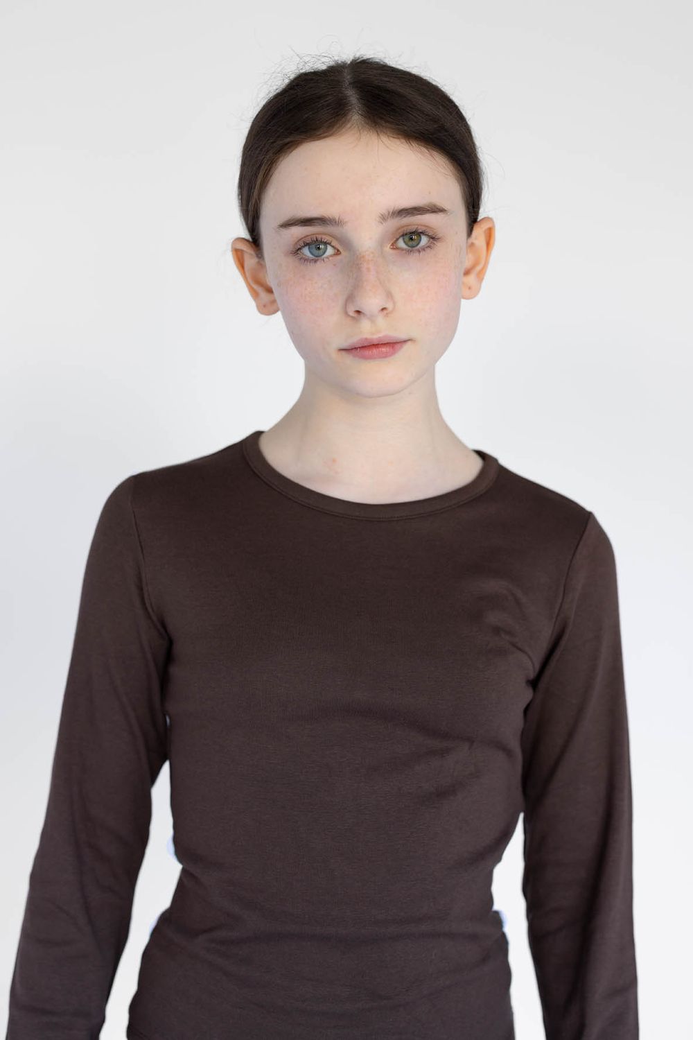 Child model portfolio headshot of a young girl, photographed at Abigail Stewart Photography studio in the Home Counties
