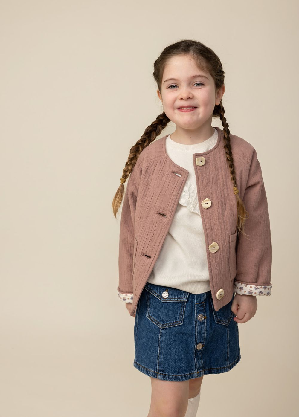 Child model full length portrait of a young girl, photographed at Abigail Stewart Photography studio in Buckinghamshire
