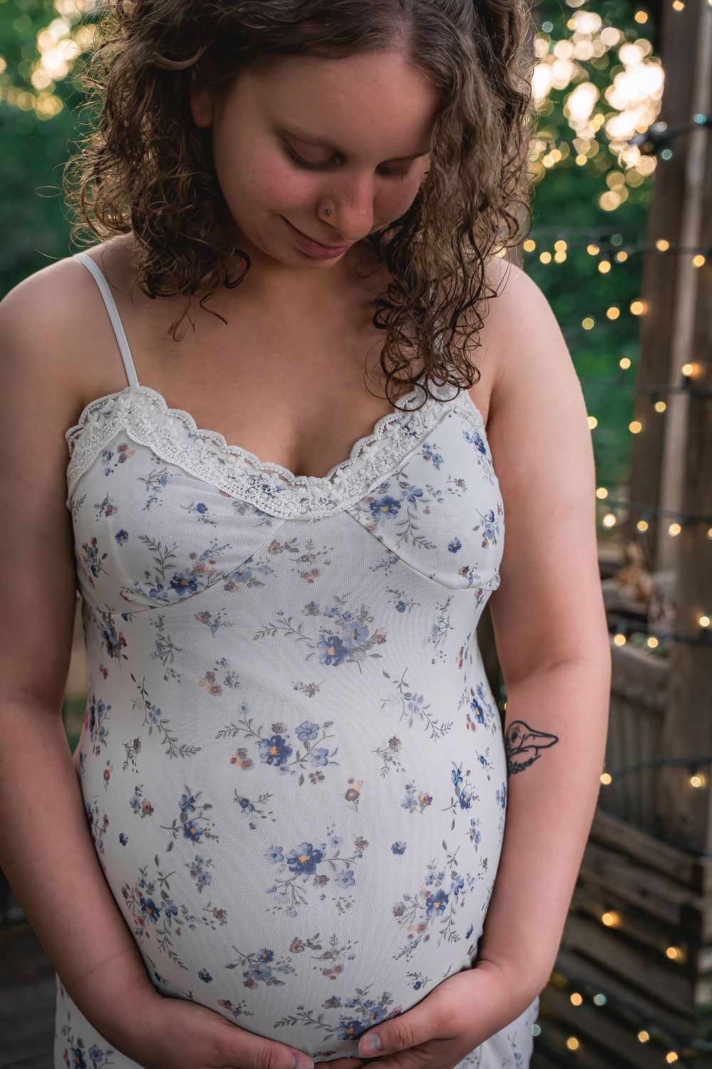 A mother admiring her baby bump