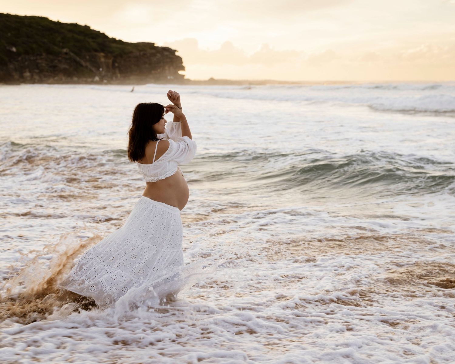 solo sunrise maternity session during a magical Sydney sunrise