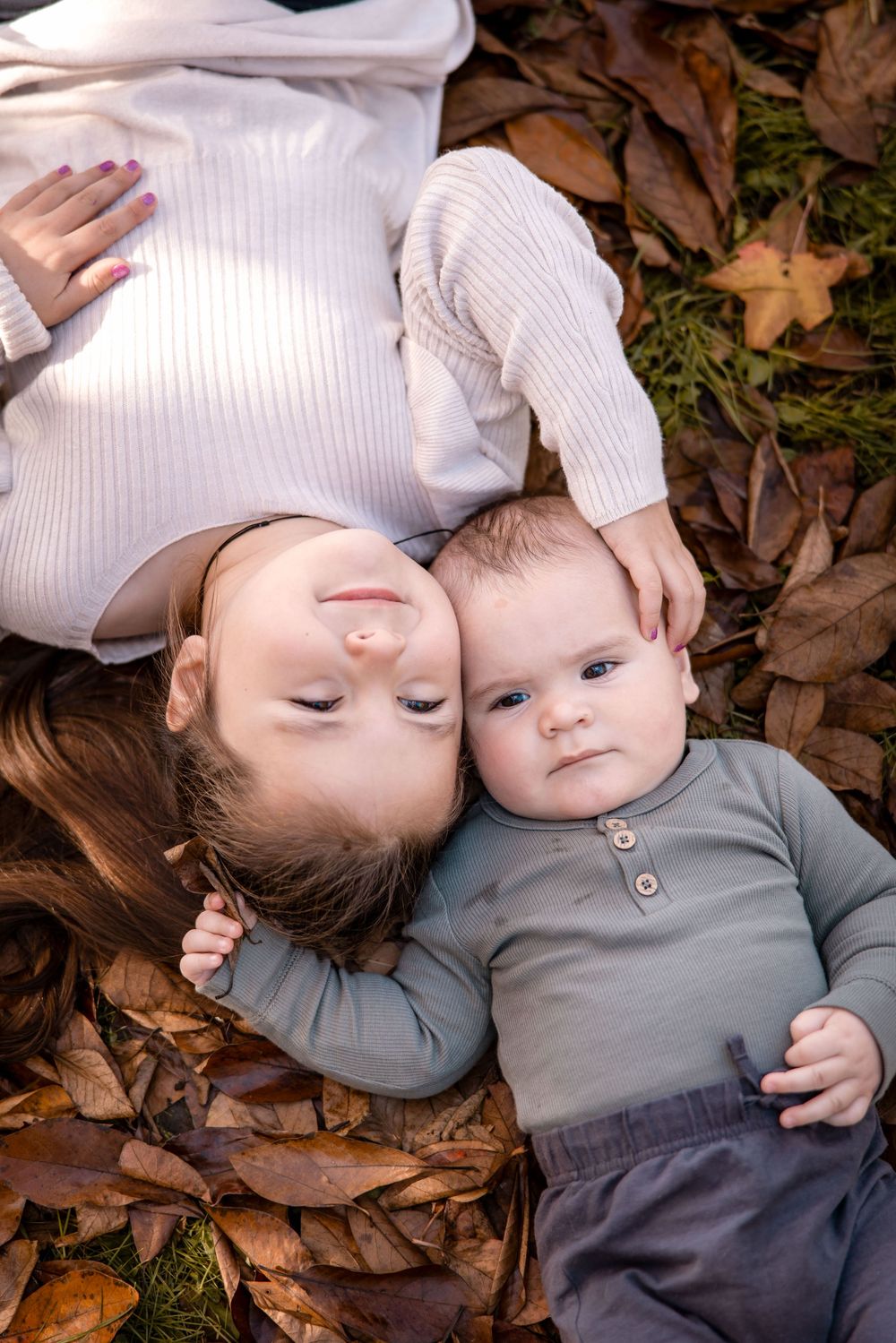 Siblings in Autumn leaves, Dolbel Reserve, Napier
