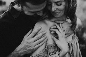 Intimate black and white family photography session with tender moments.