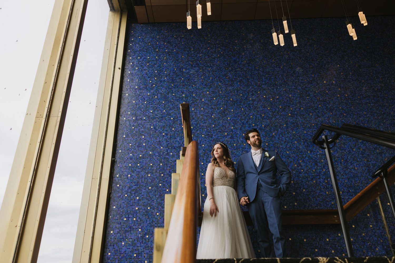 Documentary wedding photography in Michigan, capturing authentic moments at the Roostertail in Detroit Michigan
