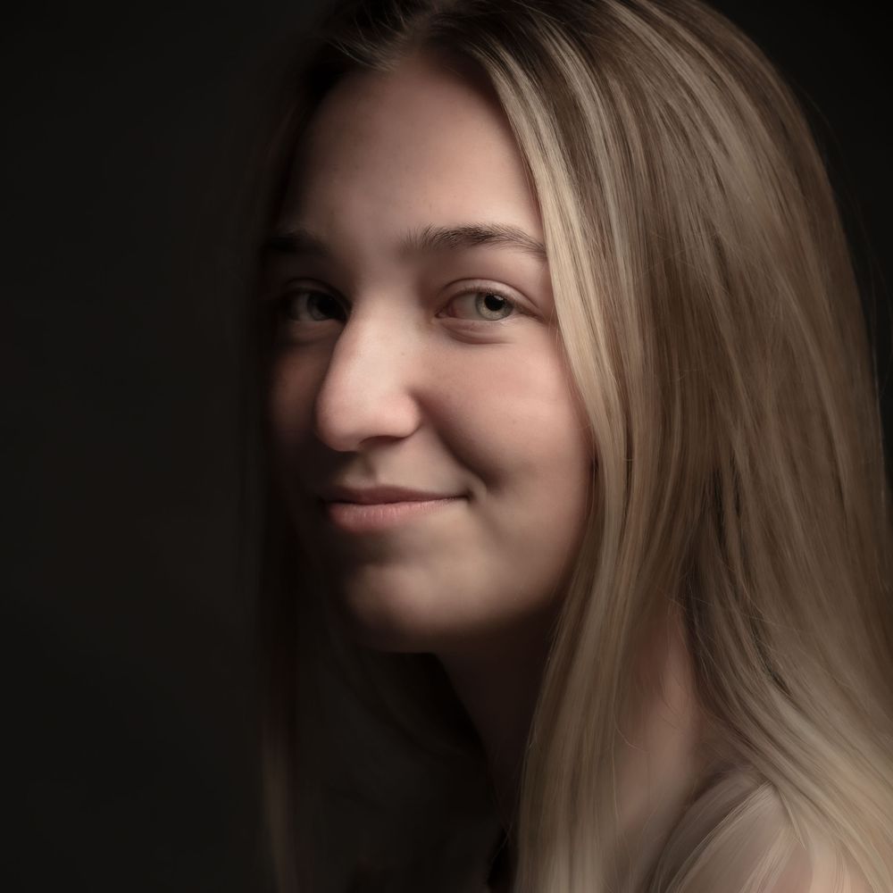 A series of moody portrait shots showing different angles and expressions in dramatic low-key lighting.