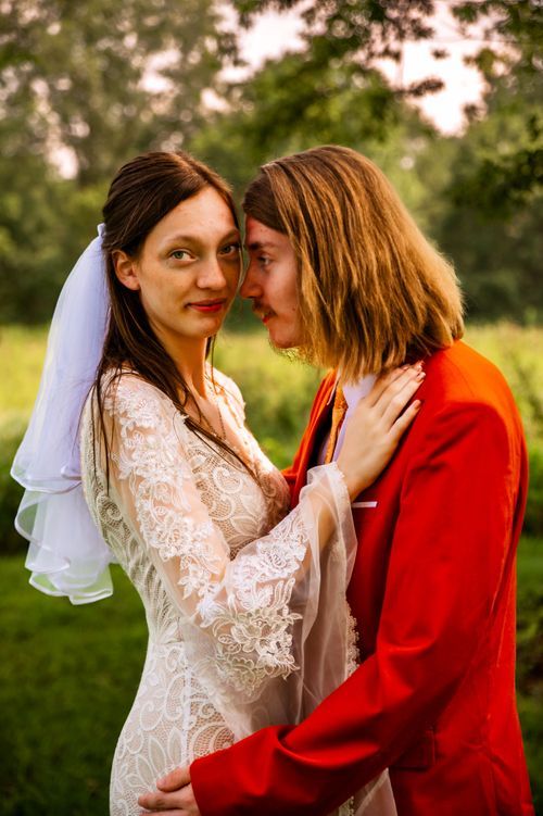 Bride and groom embracing during their wedding portraits in Northwest Ohio.