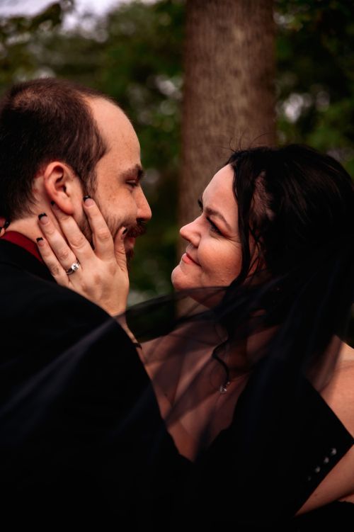 Bride and groom embracing during their wedding portraits in West Central Ohio.