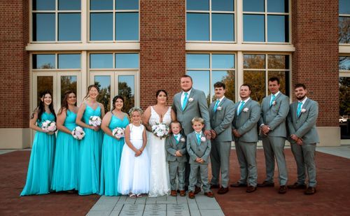 Wedding party posing together outdoors at a Northwest Ohio wedding
