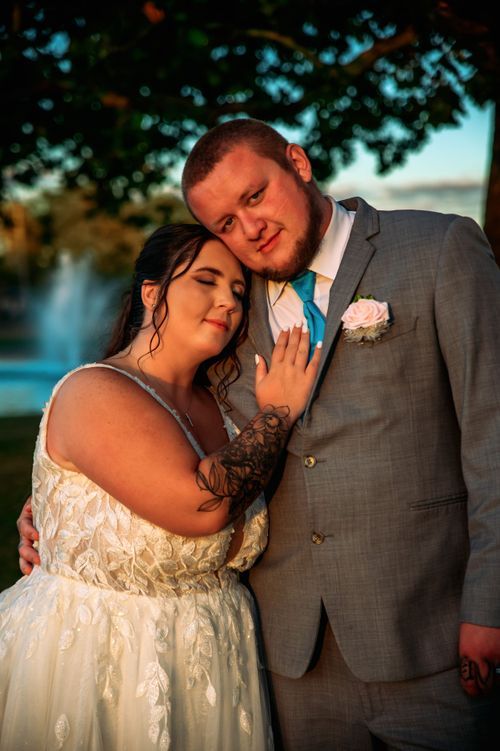 Bride and groom embracing during their wedding portraits in Northwest Ohio.
