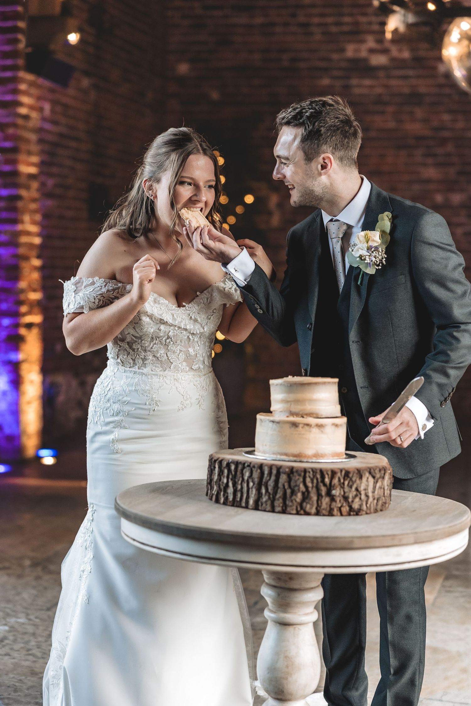 Natural cake cutting moment at Hazel Gap Barn wedding