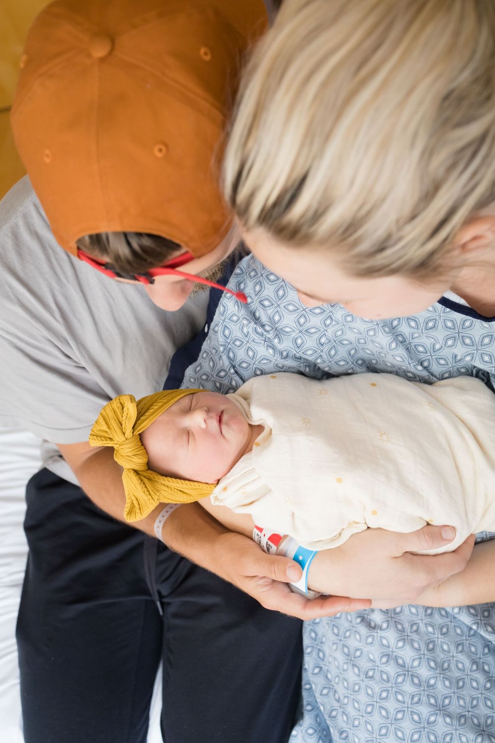 Parents in hospital admiring their newborn. Images at Fort Sanders Medical Center in Knoxville, TN by Nina Thomas Photography.
