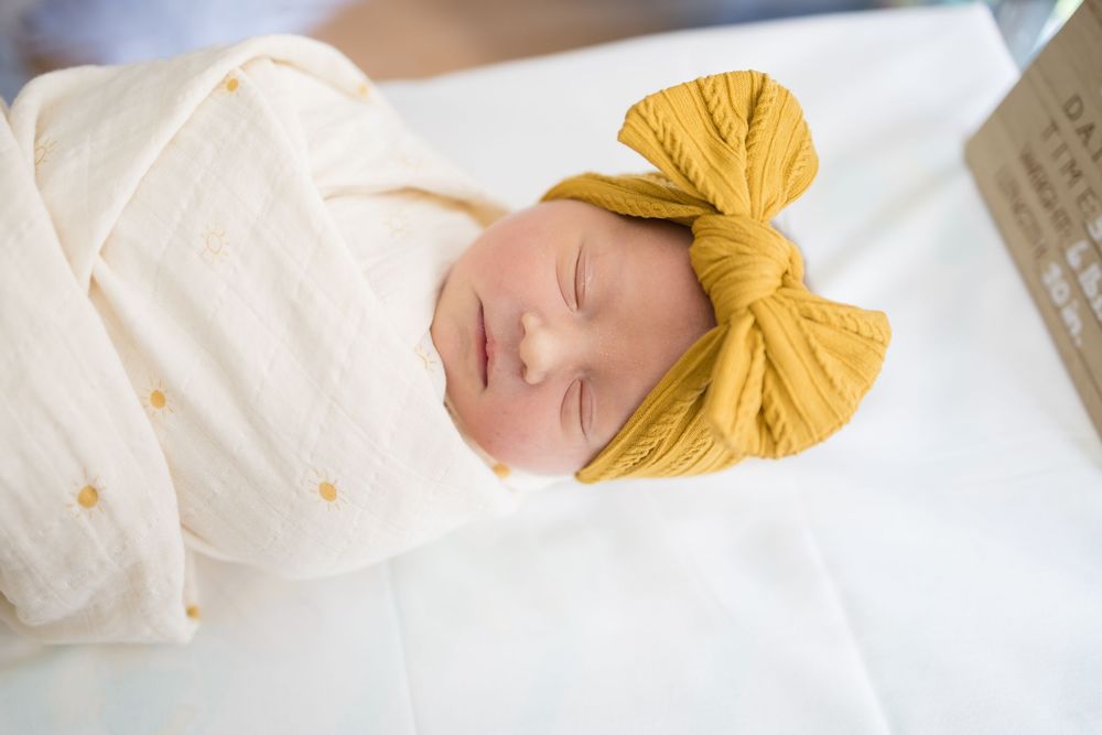 Sleeping newborn baby during Fresh 48 Session. Images at Fort Sanders Medical Center in Knoxville, TN by Nina Thomas Photography.