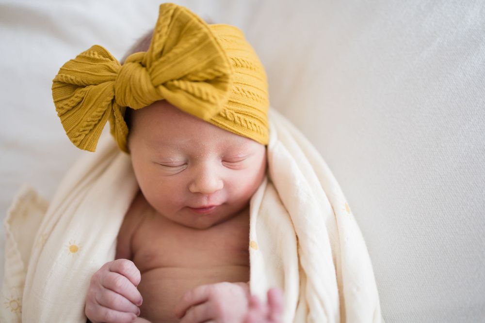 Sleeping newborn baby Images at Fort Sanders Medical Center in Knoxville, TN by Nina Thomas Photography.
