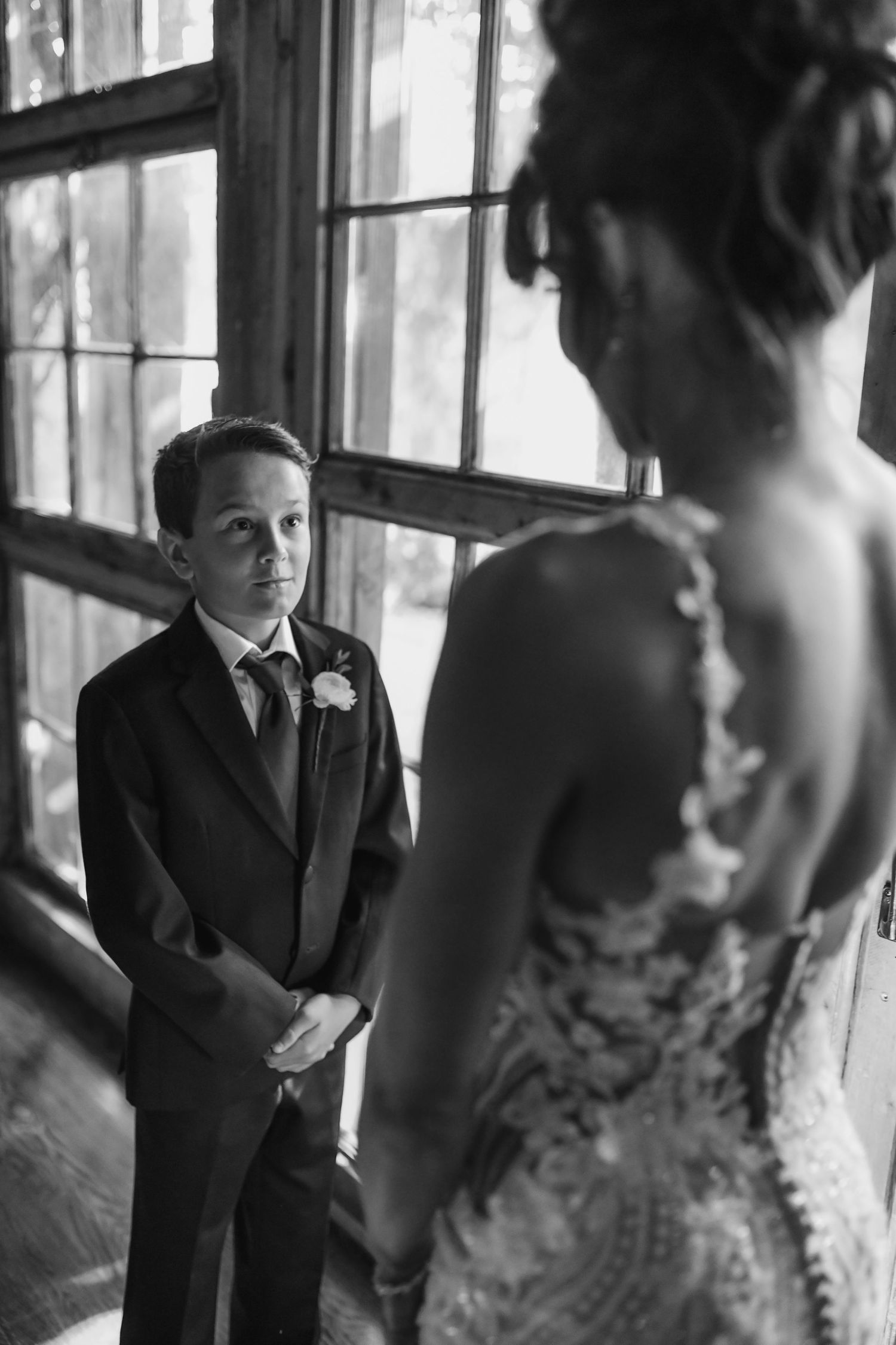 Bride and son sharing a sweet first look before the ceremony