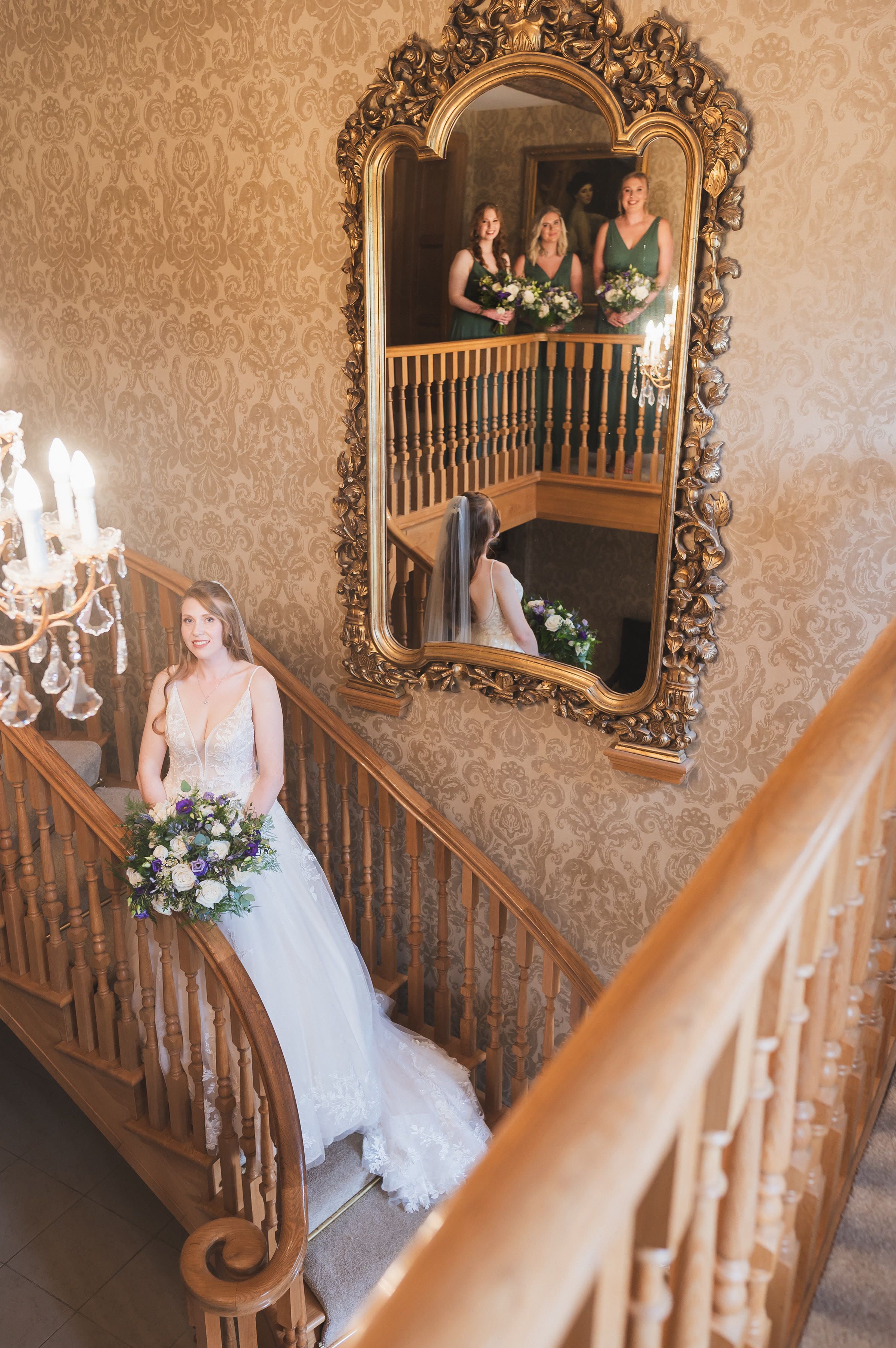 Charlotte on the staircase in the manor house at Merrydale Manor