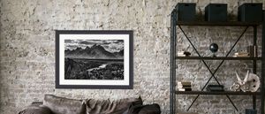 Framed Wyoming landscape fine art photography displayed in a luxury living room interior